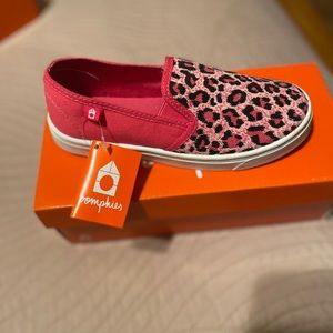 A pair of new girls Oomphies sneakers